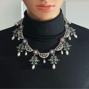 Silver Tone Statement Necklace with Clear Red Blue, & Green Gemstones Pearl Drop